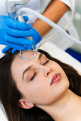 Removing wrinkles and scars through CO2 laser resurfacing. Laser skincare procedure.