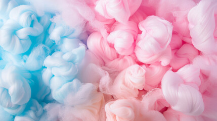 Obraz premium A close-up of fluffy, pastel pink and blue cotton candy swirls, evoking childhood memories with their light, airy, and sugary-soft appearance.