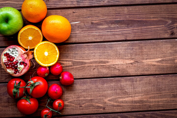 cooking salad with fresh fruits and vegetables on wooden background top view mock-up