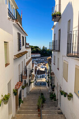 Charming white Spanish hill village overlooking the Costa del Sol, known for its white-washed buildings village in Mijas, Andalusia, Spain