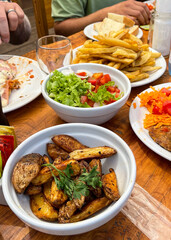 Potatoes two ways at dinner, roasted wedges and french fries