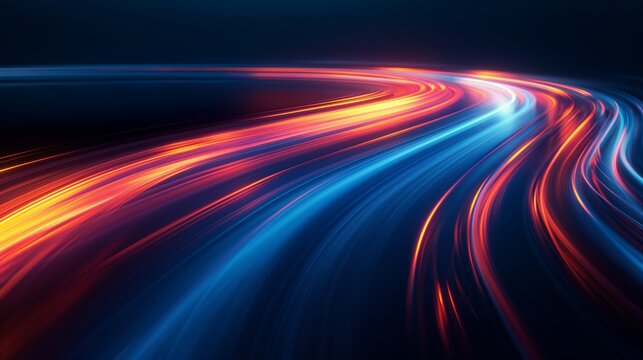 Dynamic and colorful light trails in blue and red create curves on a dark background symbolizing movement technology and speed in a futuristic setting