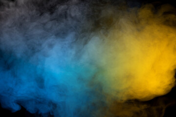 Yellow steam on a black background.