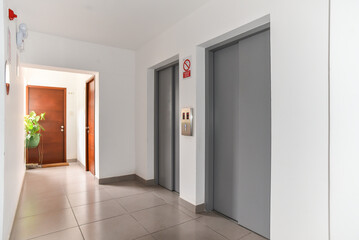 lobby entrance of apartment with elevator