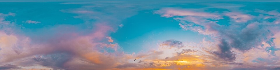 Sunset sky panorama with bright glowing pink Cumulus clouds. HDR 360 seamless spherical panorama. Full zenith or sky dome in 3D, sky replacement for aerial drone panoramas. Climate and weather change.