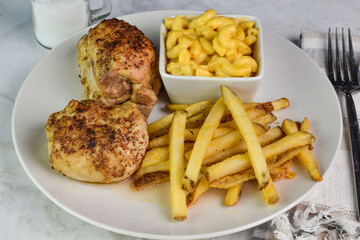 chicken thighs with  macaroni and cheese