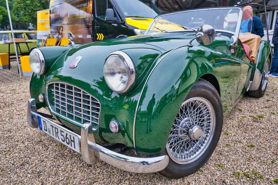Cologne, Germany, February 6th, 2024 - green Triumph TR 2 Roadster, built between 1952 and 1955. View from diagonal front