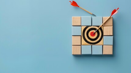 Wooden blocks with a target and arrow on a light blue background, symbolizing goal achievement and strategic planning in business. Flat lay. High quality, no realistic photo details.