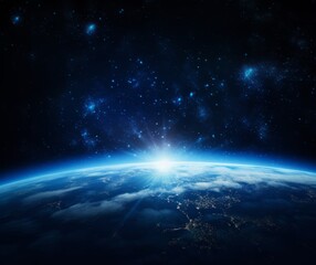 Fototapeta premium A breathtaking view of Earth from space as the sun rises over the horizon, casting a warm glow on the planet's surface.