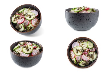 Seaweed radish cucumber salad in a bowl on a white isolated background