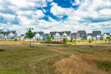 new development two story houses under a blue cloudy sky, New Neighborhood in Leesburg, Virginia.