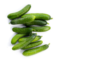 Mini cucumbers on white background.