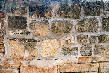 urban vintage stone background. old stone wall several shades of brown and gray.