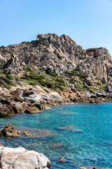 Fototapeta premium Sardinia white rock coast in Capo Testa and turquoise water on a sunny day, in Italy