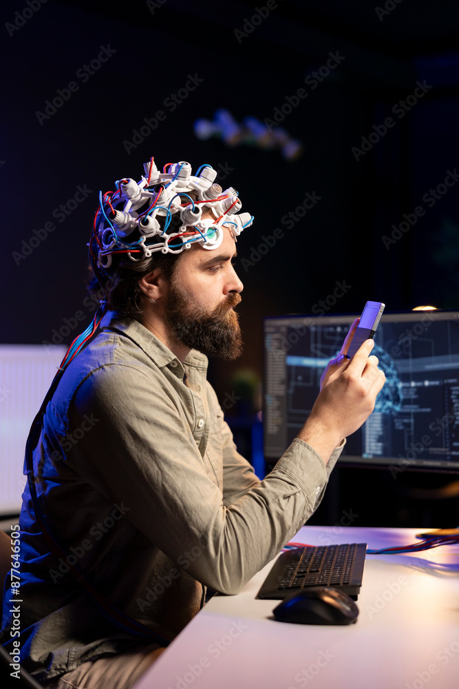 Poster engineer with eeg headset inserting cartridge into pc to use high tech software allowing for brain t