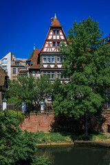 Fototapeta premium Ornate half timbered house on historic Grande Ile in Strasbourg, Alsace, France