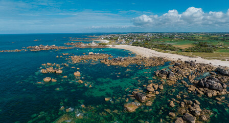 Aerial view of Pontusval Lighthouse and the beaches. Plounéour-Brignogan-Plages, France. Rocks singularly shaped. Boats moored in the Atlantic Ocean. The Coast of Legends