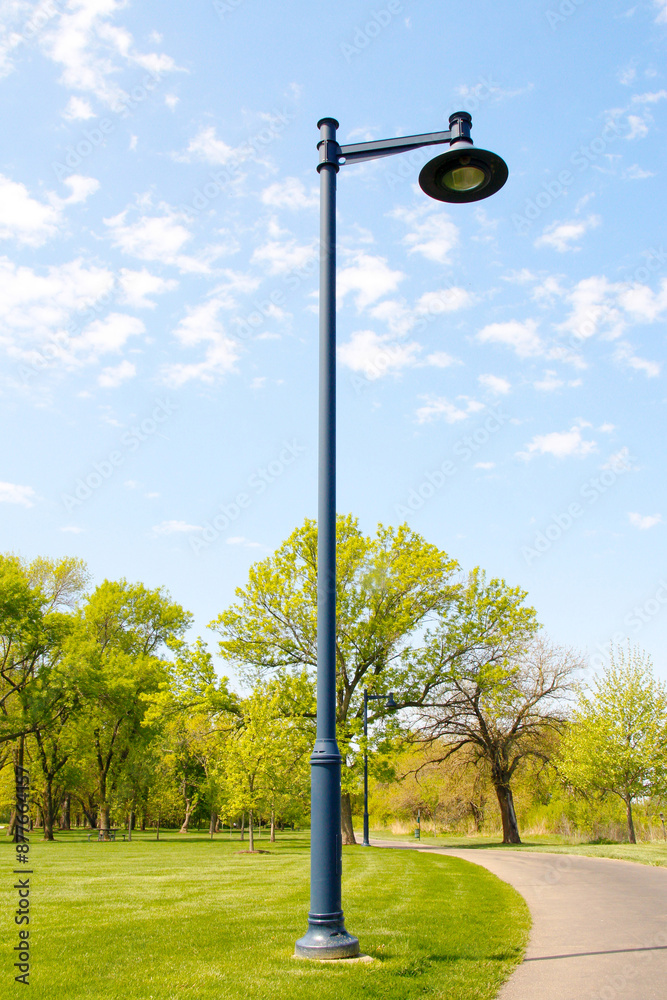 Wall mural street lamp post on a walking trail