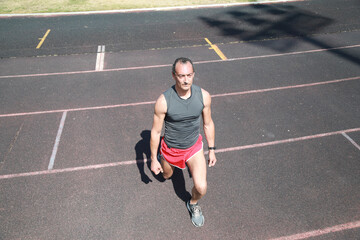 Fototapeta premium Legs Lunges During A Competition Training 