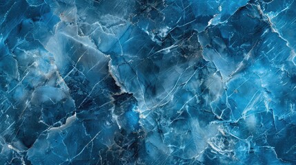 Obraz premium A blue and white tile wall with a blue and white marble pattern