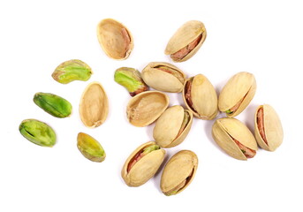Pistachios pile isolated on white background, top view