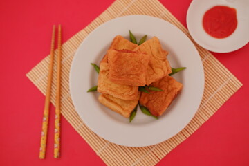 Tahu Bakso, Indonesian traditional snack made from tofu and beef. Served in white plate.