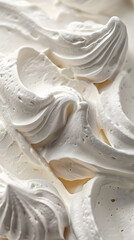 Capture the airy texture of whipped cream in a closeup shot, ideal for backgrounds, desserts, or culinary stock photography. Creamy, fluffy swirls of this confectionery offer a soft touch