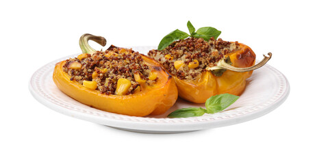 Quinoa stuffed bell peppers with corn and basil isolated on white