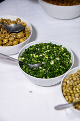 Onion. Chopped green onion, food served on plate, photograph of vegetables on table
