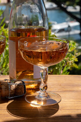 Summer party, French brut rose champagne sparkling wine in coupe glasses in yacht harbour of Port Grimaud near Saint-Tropez, French Riviera vacation, Var, France