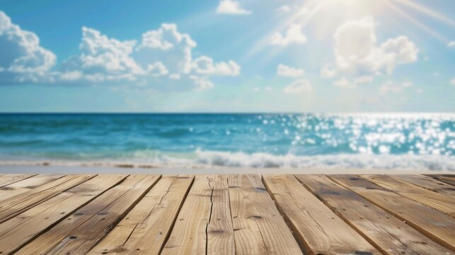 A sunny wooden deck facing a calm ocean with soft waves and a blue sky, offering a serene and inviting atmosphere perfect for relaxation and escape from daily life.