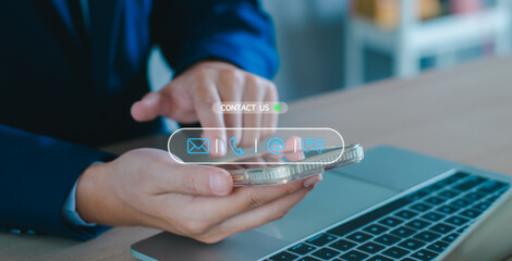 Contact us customer service concept. Man using smartphone contact call center service support phone, email, direct message, address. contact icons on virtual screen. Customer support hotline connect.