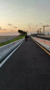Tanjung Benoa motorbike toll road. Driving at Bali Mandara.