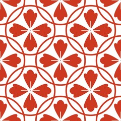 A seamless pattern of overlapping red circles with red flowers