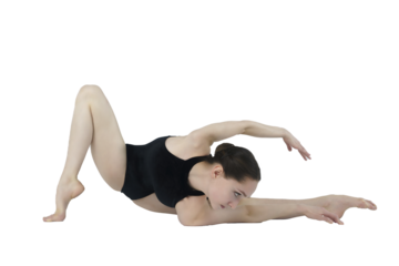 young ballerina in a dark bodysuit sitting on the floor shows stretching and eversion of her arms