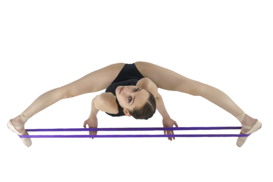 a ballerina in a dark bodysuit sitting with sports rubber shows stretching twine and eversion of the arms