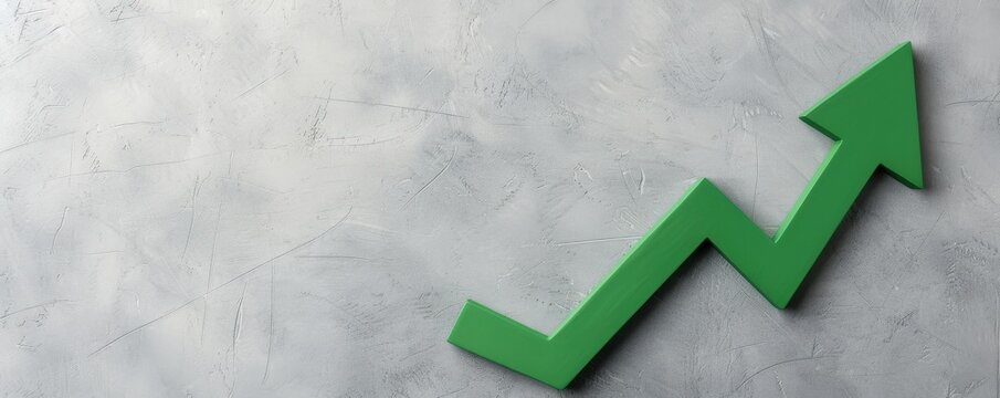 Green arrow trending upwards on a textured gray background, symbolizing growth, success, and positive progress in business or finance.