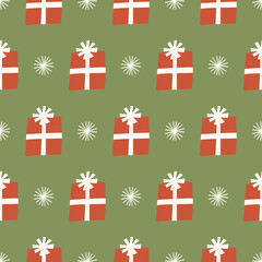 Fototapeta premium Christmas gift box seamless pattern. Paper cutout red present boxes on green background. Ideal for wrapping paper, stationeries, textile, and more.