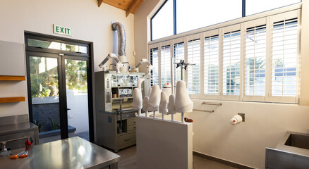 Prosthetic lab with advanced equipment and tools for creating artificial limbs, copy space