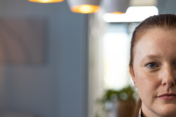 Close-up of woman in medical clinic, focusing on work with determination, copy space