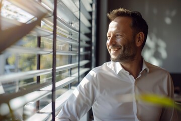 Obraz premium happy businessman having a break in office