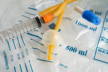 Foley urinary catheter with urine bag for disability or patient in hospital.