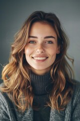 Fototapeta premium A woman wearing a long-sleeved turtle neck sweater, her long hair falling down her back