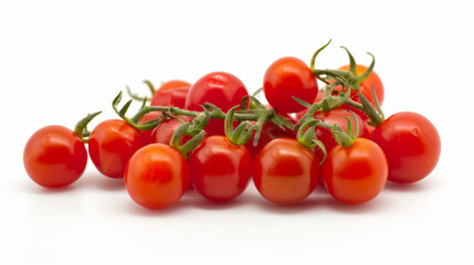 A bunch of red cherry tomatoes are sitting alone on a white background.