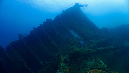 Underwater photography of the spooky USS Liberty shipwreck from the second world war WWII. From a scuba dive off the coast of Bali.