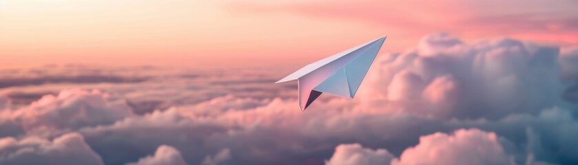 Paper airplane soaring through the clouds at sunset with a beautiful pinkish sky, symbolizing dreams and imagination.