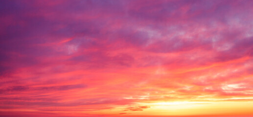 Colorful cloudy sky at sunset. Gradient color. Sky texture. Abstract nature background