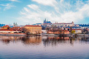 Obraz premium View of the city of Prague castle in hradcany and the Vltava river with Charles bridge in Prague, Czech Republic.