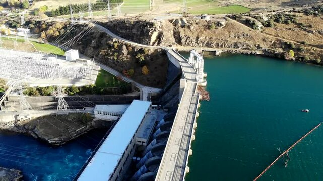Aerial view looking down over the Roxburgh dam and power plant and Roxburgh Lake