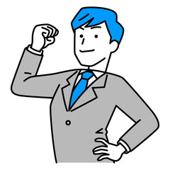 力こぶを作ってみせるスーツの男性